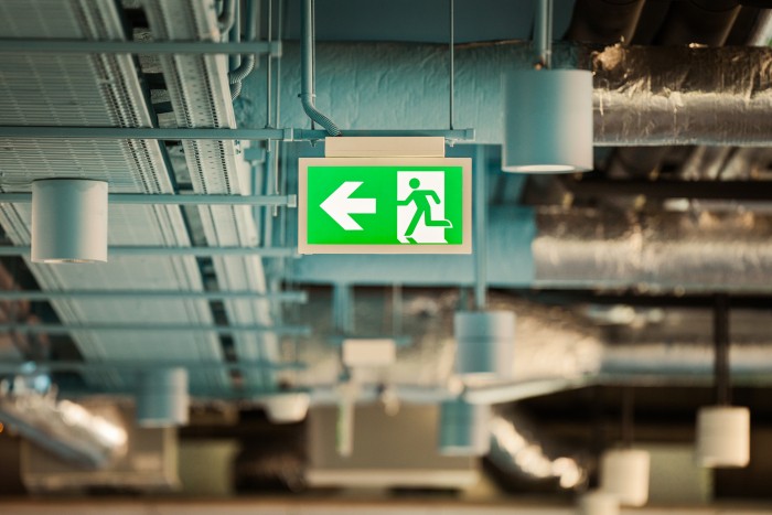 Emergency exit sign. Office spaces
